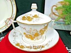 AK Limoges France tea cup and saucer painted 24kt gold butterfly blossom teacup