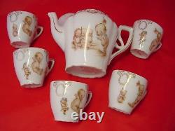 ANTIQUE ROSE O'NEILL KEWPIE PORCELAIN TEA SET, Teapot and 5 Cups, VERY GOOD COND