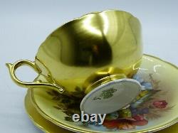 Antique Aynsley Trio comprising a tea cup with saucer and cake plate in the Gold