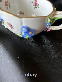 Antique Meissen Footed Teacup And Saucer With Blue Applied Flowers