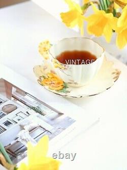 Antique Paragon flower/floral handle tea cup and saucer
