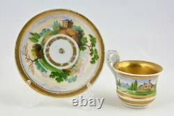 Antique Russian gilt porcelain tea cup with saucer, early 19thC