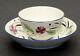 Antique Soft Paste Porcelain Fancy Floral Handleless Tea Cup & Tea Bowl Saucer