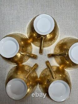 Antique Set Of 5 Golden Porcelain Teacups And Saucers