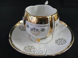 Antique Unmarked Tea Cup & Saucer Set Gold Accent Footed Base Floral Pattern