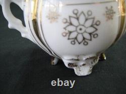 Antique Unmarked Tea Cup & Saucer Set Gold Accent Footed Base Floral Pattern