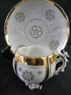 Antique Unmarked Tea Cup & Saucer Set Gold Accent Footed Base Floral Pattern