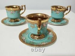 Arnart Creation teacup and saucer blue and gold pink flowers