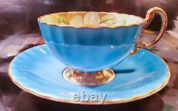 Aynsley Teacup & Saucer Turquoise Dogwood Flowers on Pale Yellow & Gold Exterior