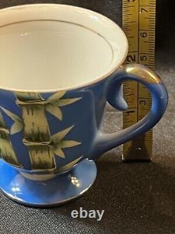 China tea cup saucer bamboo design hand painted Japan blue green gold accent