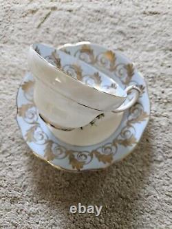 E B Foley Bone China Tea Cup Saucer Light Blue Flowers Fruit Gold Trim