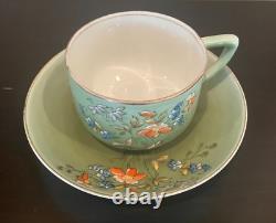 Kuznetsov Russian Imperial Factory Hand Painted Flowers Gilt teacup/saucer