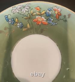 Kuznetsov Russian Imperial Factory Hand Painted Flowers Gilt teacup/saucer