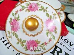 Limoges France tea cup and saucer painted pink rose signed cream soup teacup 20s