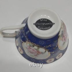 Miss Havisham's Blue Floral Fragrant Swine Insult Tea Cup & Saucer