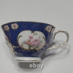 Miss Havisham's Blue Floral Fragrant Swine Insult Tea Cup & Saucer