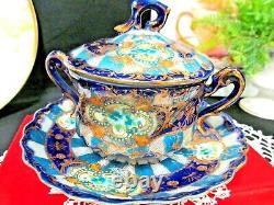 Nippon tea cup and saucer cobalt blue gold gilt covered lid teacup Japan footed