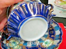 Nippon tea cup and saucer cobalt blue gold gilt covered lid teacup Japan footed