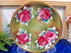 Nippon tea cup and saucer painted double handle teacup pink roses raised gold