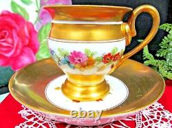 Old Paris France tea cup and saucer all gold footed painted rose floral teacup