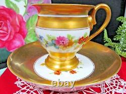 Old Paris France tea cup and saucer all gold footed painted rose floral teacup