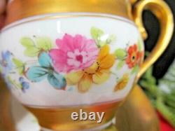 Old Paris France tea cup and saucer all gold footed painted rose floral teacup