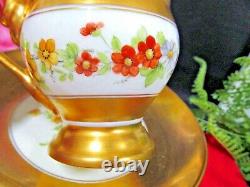 Old Paris France tea cup and saucer all gold footed painted rose floral teacup