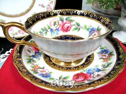 PARAGON tea cup and saucer cobalt blue & pink rose floral teacup England 1950s