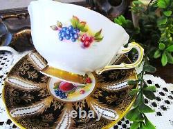PARAGON tea cup & saucer Black & gold painted orchard fruits Teacup England DW