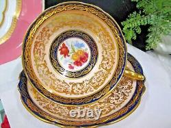 PARAGON tea cup & saucer Cobalt blue & floral gold gilt teacup England 1950s