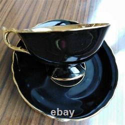 Paragon Black Teacup & Saucer Floating Three Roses on Heavy Gold Bowl