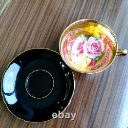 Paragon Black Teacup & Saucer Floating Three Roses on Heavy Gold Bowl
