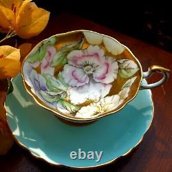 Paragon Blue Teacup & Saucer Floating Three Pansies on Heavy Gold Bowl