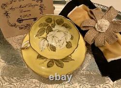 Paragon Double Warrant Yellow Tea Cup Saucer With White Rose