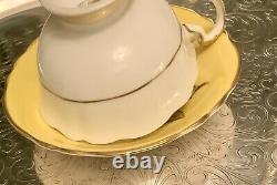 Paragon Double Warrant Yellow Tea Cup Saucer With White Rose