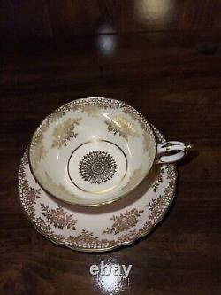 Paragon Tea Cup & Saucer Mottled Pink And Gold Flower Double Stamped