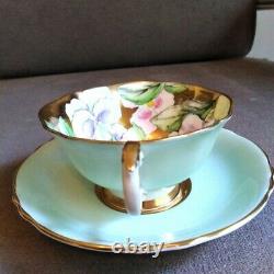 Rare Paragon Heavy Gold Green Teacup & Saucer Floating Three Pansy Flowers