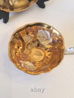 Rare Queen Anne White Floral Rose With Gold Guided background Teacup And Saucer