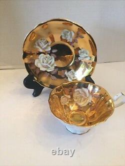 Rare Queen Anne White Floral Rose With Gold Guided background Teacup And Saucer