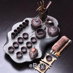 Real zisha tea set with tea tray black stone heavy tea table purple grit pot cup