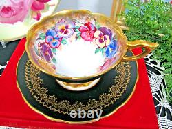 Royal Stafford tea cup and saucer black gold gilt pansy garland teacup England