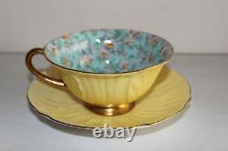 Shelley Light Yellow Daisy Chintz-Oleander Bone China Footed Teacup and Saucer