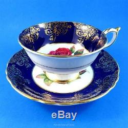 Signed Red Rose Center with a Cobalt and Gold Border Paragon Tea Cup and Saucer
