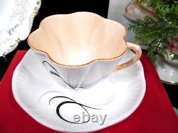 Stunning Shelley tea cup & saucer Art Deco peach Fantasy Dainty shape teacup