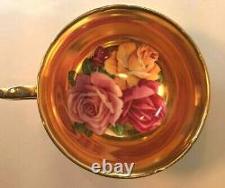 Stunning and Rare Gold Triple Rose Paragon Tea Cup and Saucer, Black background