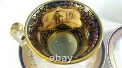 Tea cups & saucers. Sevres style painted panel inside Cobalt blue & antique gold