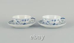 Two sets of Royal Copenhagen Blue Fluted Plain tea cups and saucers