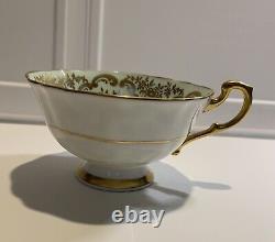 Vintage Paragon Peach and Gold Tea Cup and Saucer