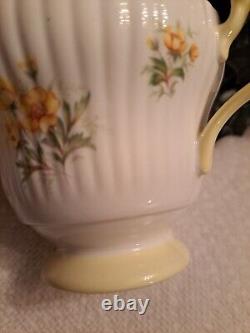Vintage Royal Dover Bone China Mother teacup and saucer-Yellow flowers & trim
