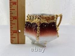 Vintage/antique Unbranded Tea Cup & Saucer Of High Gold Floral Relief 1760